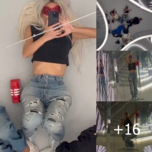 Kim Kardashian showcases her toned abs in a cropped top and ripped jeans as she enjoys exploring an art exhibition... shortly after receiving highest honor at Baby2Baby Gala