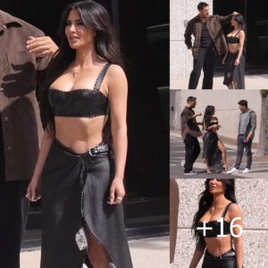 EXCLUSIVE: Ready for her close up! Kim Kardashian shows off her vivacious curves in a busty leather bandeau top as she's assisted by her glam squad on set of photo shoot at her Calabasas office 