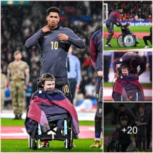 WARM MAN: Jude Bellingham gave the young England mascot his jacket before the game started as heavy rain poured over Wembley 🥹🌧️