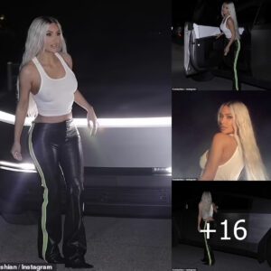 Kim Kardashian loves her new set of wheels as she rocks leather pants and a crop top for a steamy photoshoot with her Tesla Cybertruck