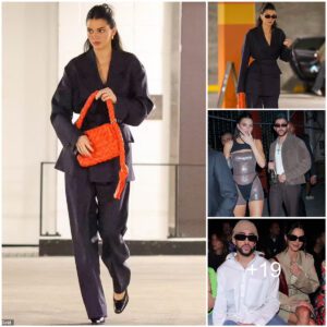 Kendall Jenner turns carpark into a catwalk as she models $4,600 designer bag with chic navy suit while out in Beverly Hills