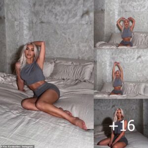 "Sizzling Sensation: Kim Kardashian Shows off Toned Abs in Bed with SKIMS"