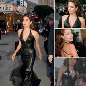 Graceful Elegance: Angelina Jolie’s Enchanting Look in a Shoulder-Baring Gown and Tied-up Tresses