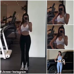 Kendall Jenner shows off her sculpted figure in a white sports bra and fitted leggings for Alo Yoga while enjoying a gym session