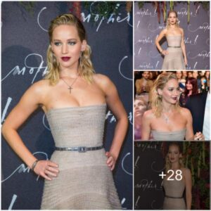 Stunning Elegance: Jennifer Lawrence Graces Mother! Premiere in Paris, Flaunting a Sensational Figure in a Gorgeous Strapless Ruffled Gown.