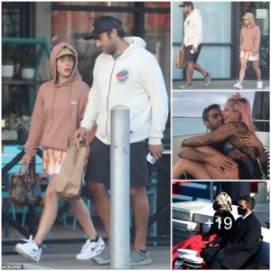 Lady Gaga cuts a sporty figure in a hoodie and tie-dye shorts as she and boyfriend Michael Polansky stop by grocery in Malibu