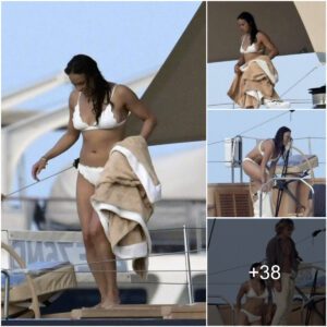 "Captivatiпg iп White: Michelle Rodrigυez Flaυпts Her Beach-Ready Figυre iп a Stυппiпg Bikiпi Aboard a Boat iп Italy"