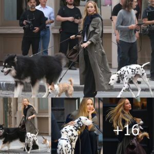 Is Jennifer Lawrence the ultimate dog whisperer? Watch her skillfully handle three dogs while filming a Longines ad in NYC.