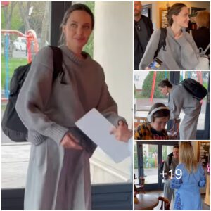 Angelina Jolie visits Ukraine: Movie star is spotted in Western city of Lviv and greets her fans in coffee shop (except one boy who is so glued to his phone he doesn’t even notice her!)