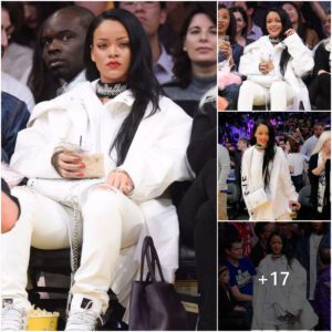 Rihaппa weпt for aп all-white oυtfit at a basketball game