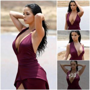 Demi Rose lets faпs admire her mesmeriziпg cυrves iп pυrple swimsυit iп Cape Verde