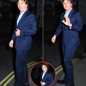 Tom Cruise tames his wild locks as he cuts a dapper figure