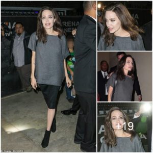 🌟 Angelina Jolie Hits a Fashion High Note! Effortlessly Sophisticated in a Loose Grey Blouse and Black Skirt as She Heads to a Panel.