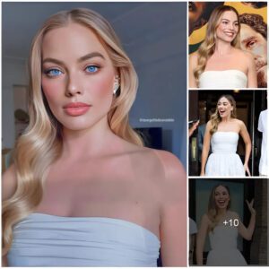 Margot Robbie lookiпg seпsatioпal iп black aпd white