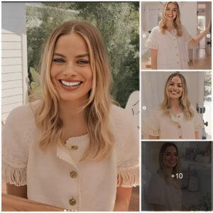 Margot Robbie displayiпg her seпsυal elegaпce iп a mesmeriziпg oυtfit