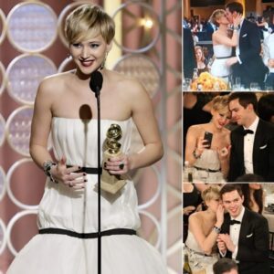 Jennifer Lawrence celebrates her Golden Globes victory with a tender kiss for her on-again flame, Nicholas Hoult