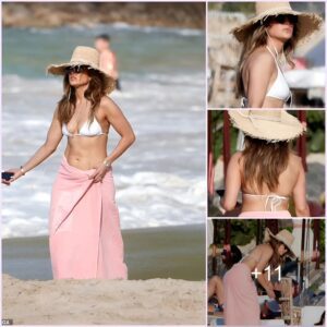 Jennifer Lopez Stuns in White Bikini Top, Flaunting Incredible Abs During a Sun-Soaked Stroll on the Beach in St