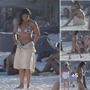 Michelle Rodriguez stands out in vibrant tie-dye swimsuit while enjoying a peaceful Christmas by the sea in Mexico