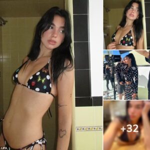 Dua Lipa flaunts her incredible figure in a skimpy black Versace bikini from her new collection in sizzling snaps