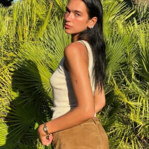 Dua Lipa Shows Her "Sun Bum" In Suede Hot Shorts