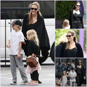 Fun day in the sun! Angelina Jolie rocks a stylish all-black outfit while exploring Sydney with her daughters Shiloh and Vivienne.