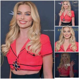 Margot Robbie stuns in pink and black outfit