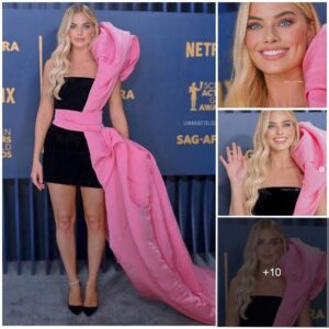 Margot Robbie dominating her allure in a tantalizing dress