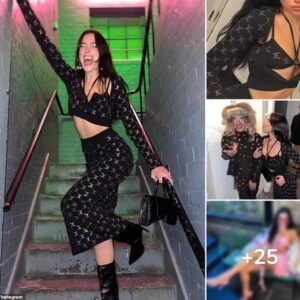 Dua Lipa sends temperatures soaring as she flashes her toned midriff in a skimpy black crop top and matching skirt for sizzling snaps