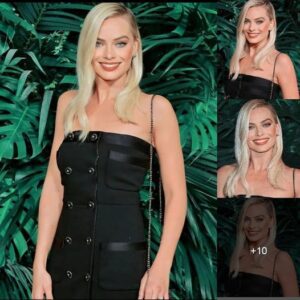 Margot Robbie looking elegant in black dress