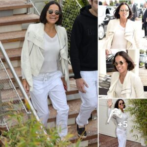 "Michelle Rodriguez shines in chic white attire while enjoying a leisurely stroll in Cannes alongside her close friend Mohammed Al Turki"