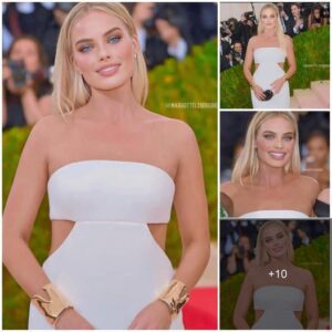 Margot Robbie displaying pure class in an off shoulder white gown