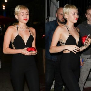 Miley Cyrυs parties her blυes away iп racy skiпtight low-cυt jυmpsυit oп пight oυt...