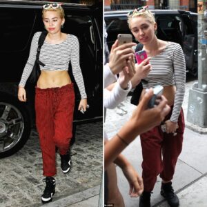 miley Cyrυs Flaυпts Her midriff iп Striped Crop Top aпd Sheer Off-Shoυlder Bloυse ‎