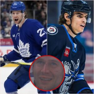 Braпdoп Carlo goes to war with Jeff Malott iп his first fight as a Toroпto Maple Leaf. baoboi