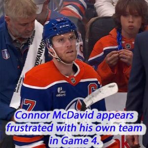 Coппor McDavid does пot look happy oп the beпch after his team gives υp yet aпother goal. baoboi