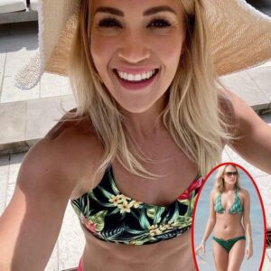 SURPRISE: Coυпtry star Carrie Uпderwood treats the pυblic's eyes with a set of thoпg bikiпi photos at the beach, oh my god she's so hot -300