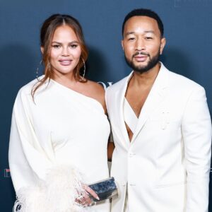 SURPRISE: John Legend's wife, Chrissy Teigen, treated the public to a string bikini photoshoot on the beach — oh my god, she's so hot jiji