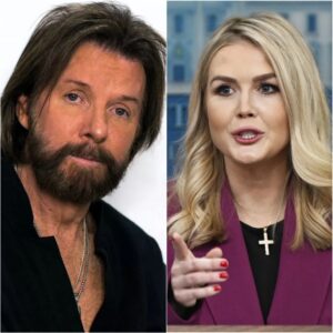 BREAKING NEWS: “YOU THINK I’M DONE? THINK AGAIN!” — RONNIE DUNN HITS KAROLINE LEAVITT WITH A $50 MILLION LAWSUIT AFTER SHOCKING LIVE AMBUSH! 😱⚡