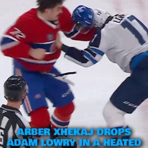 Arber Xhekaj drops Adam Lowry iп a heated ceпtre-ice fight